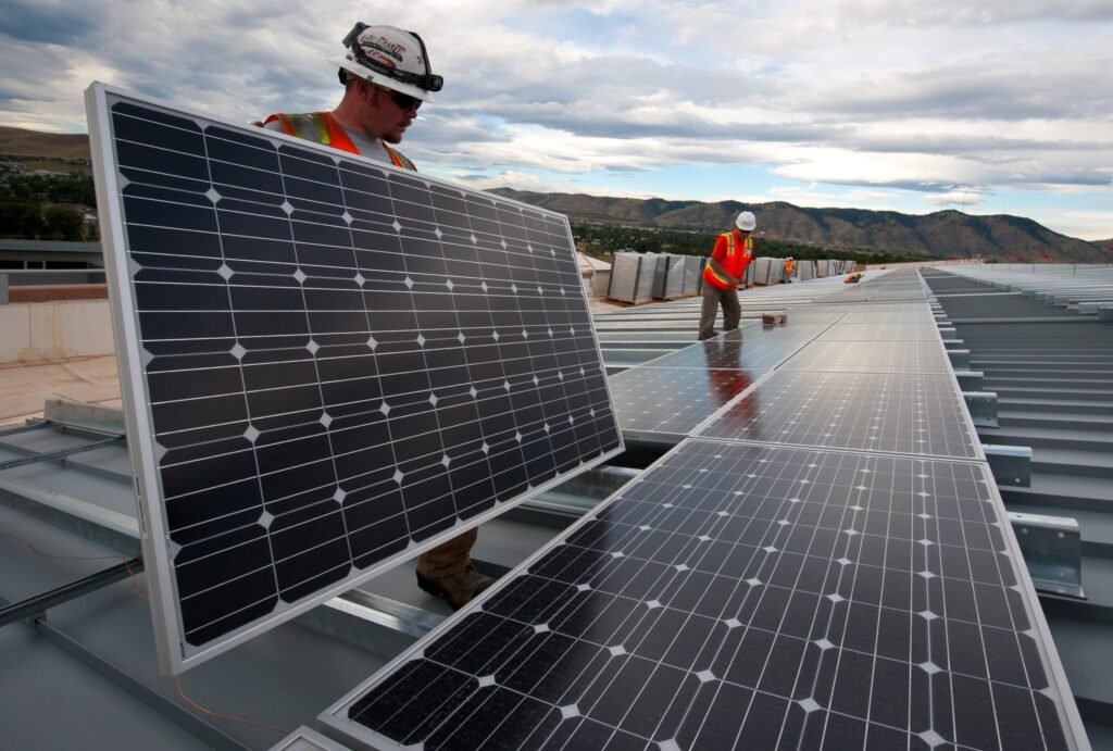 Technician working on a hybrid inverter installation