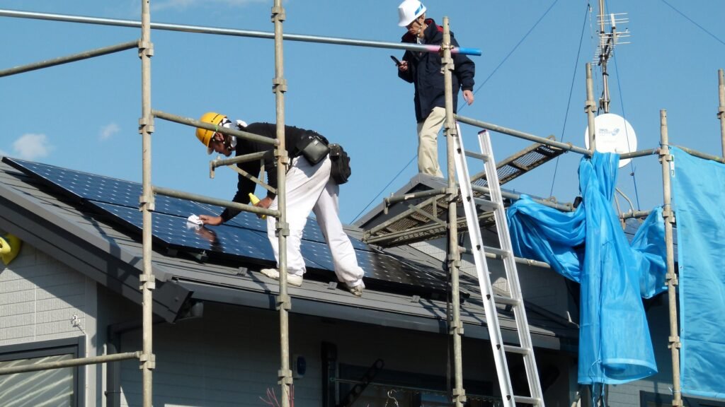 Amana technician performing a battery installation